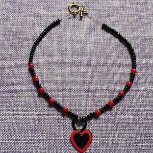 Black and Red Beaded Necklace with Heart Pendant